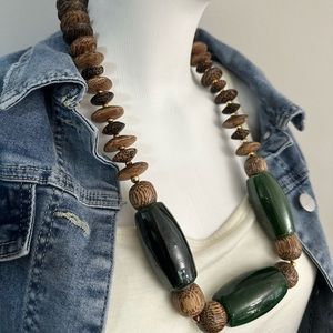 Huge safari look necklace with wood and three intriguing hunter green pieces